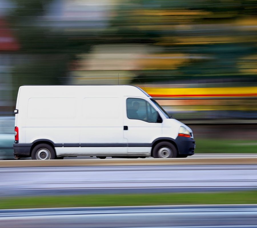 Blur white van panning and move